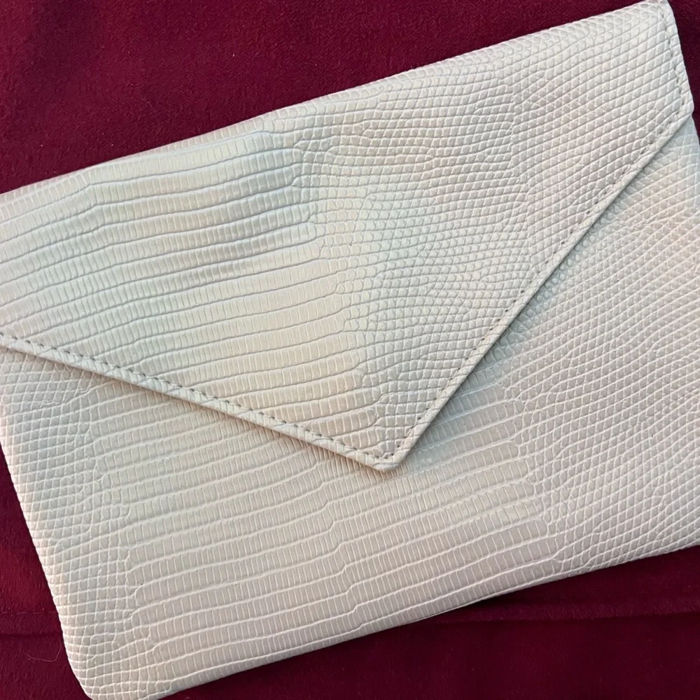 IPSY Envelope Accessory Bag Embossed Cream and Green with Snap Closure.